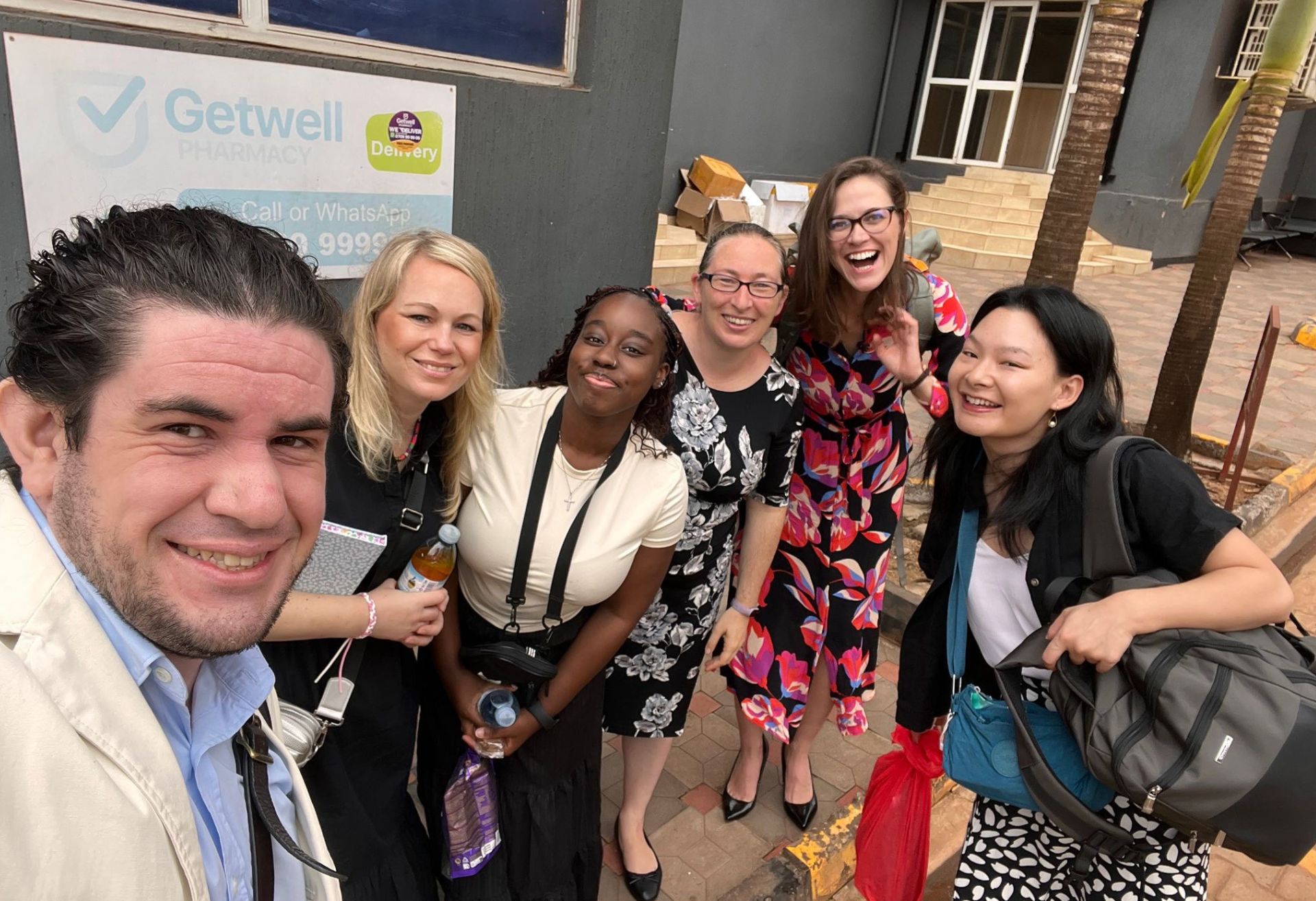 Esther (middle) and the international team of lawyers walking to the UCLF office