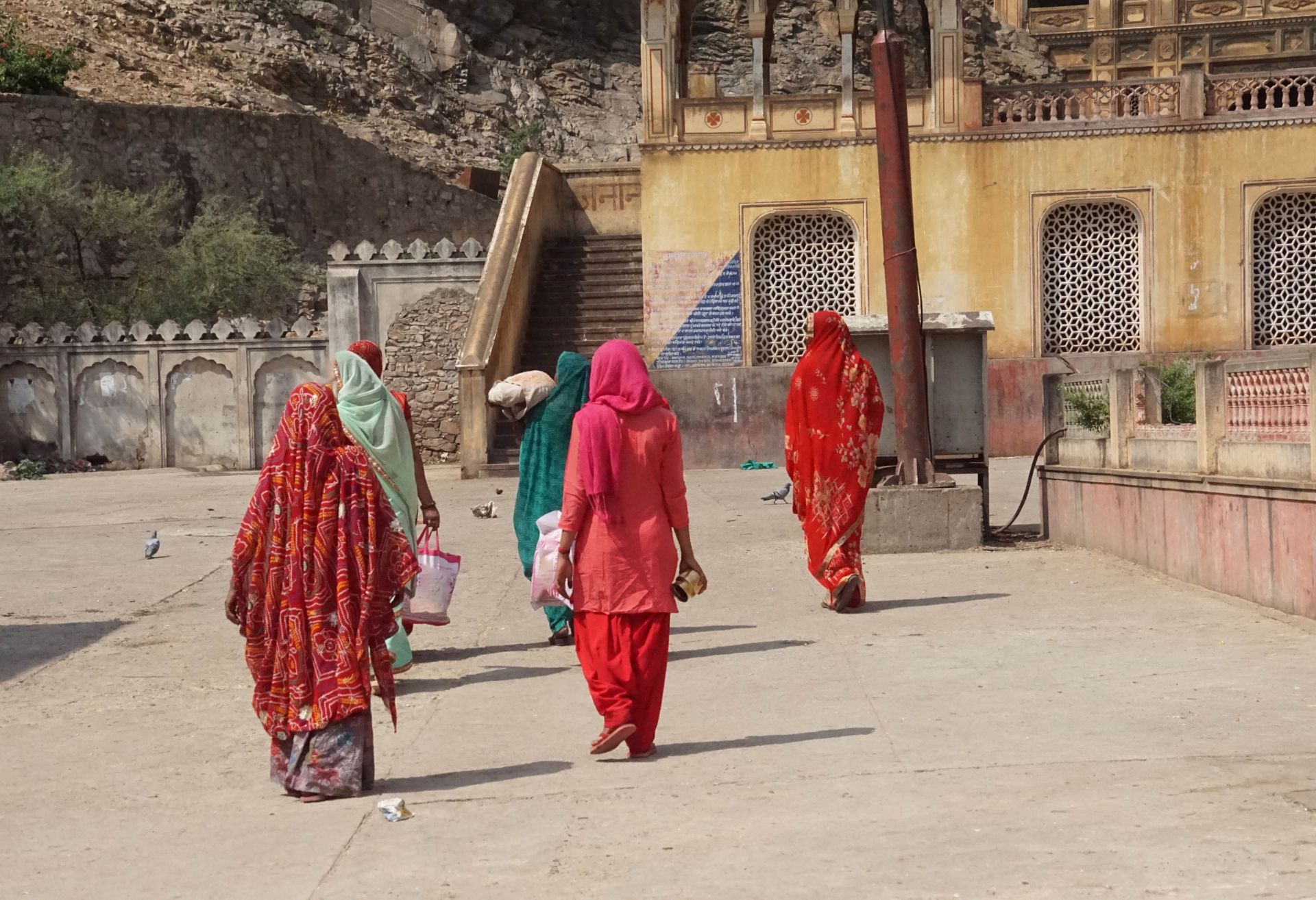 Image of women walking away from camera