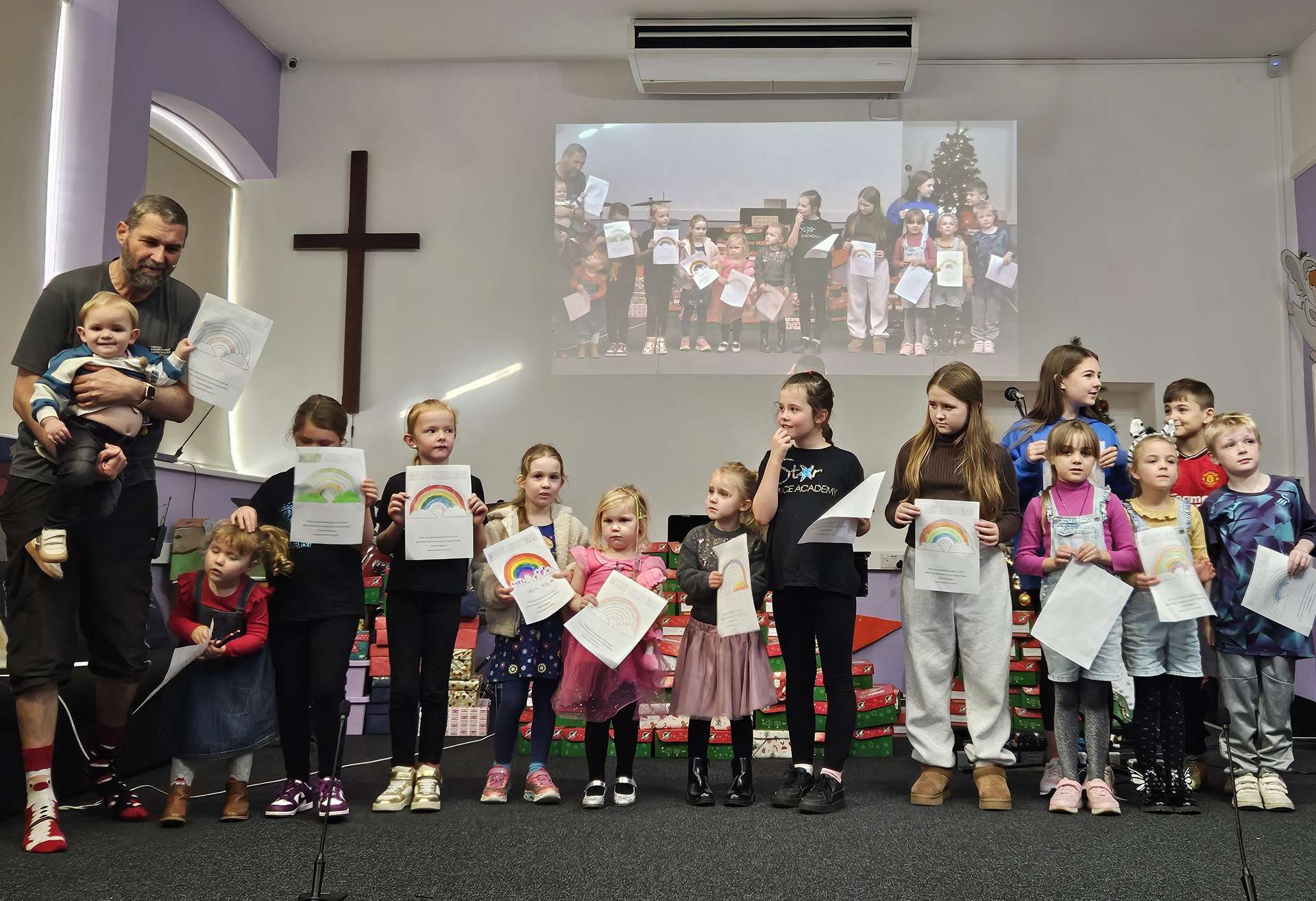 Image of children donating to Operation Christmas child shoebox